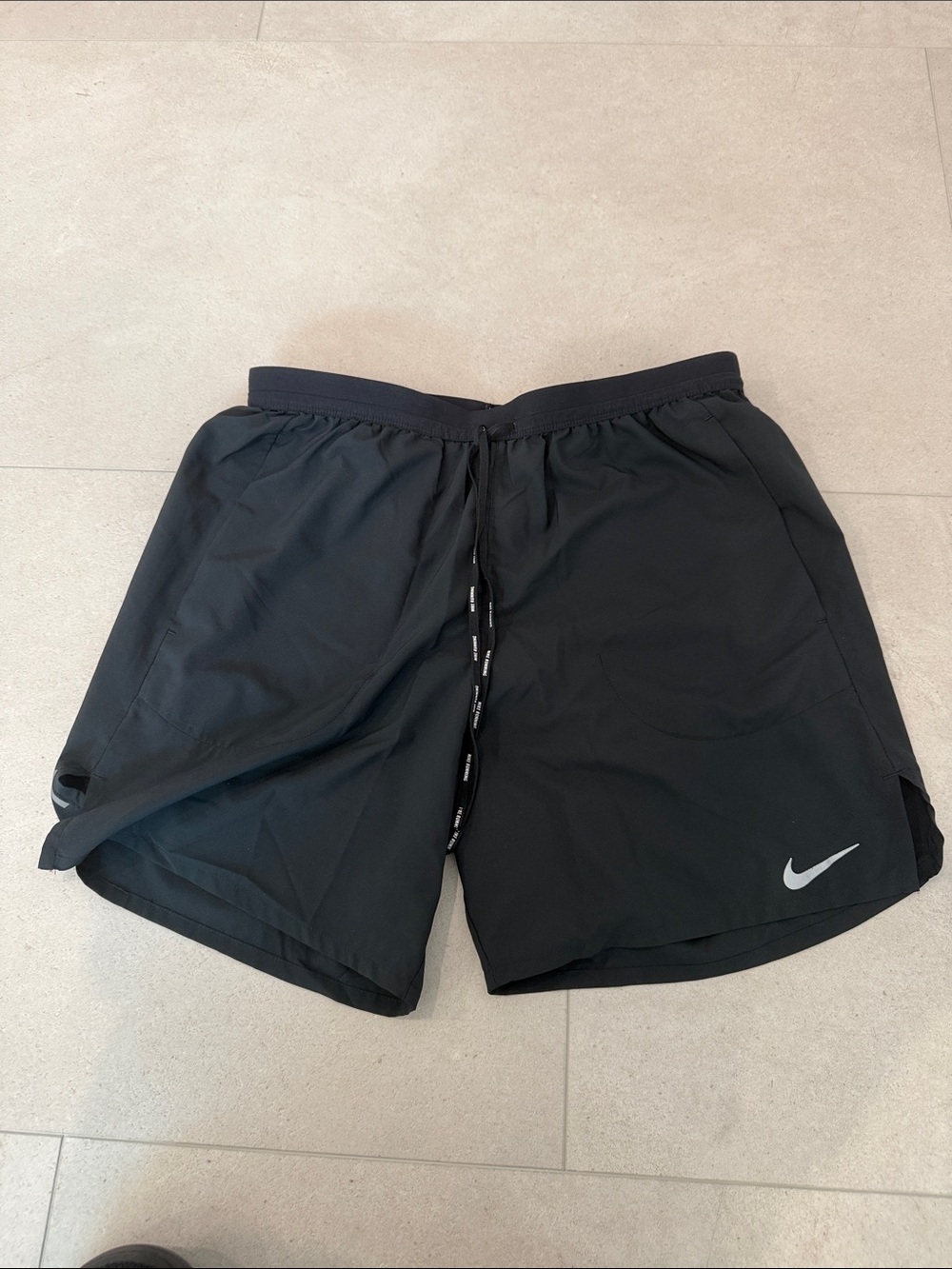 Nike Men’s Black Athletic running Shorts with Silver Swoosh
